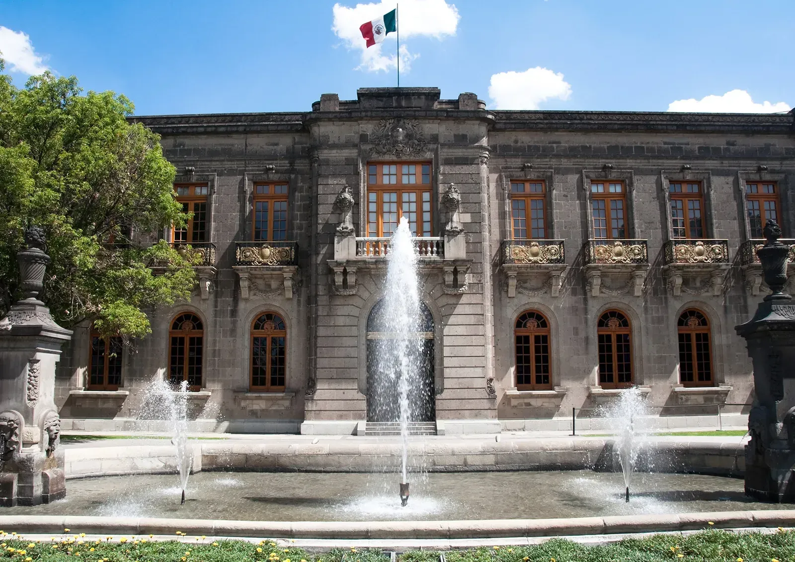 Chapultepec Castle with fountains and Mexican flag, Mexico City